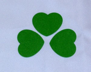 Punch or cut hearts to create shamrock shapes