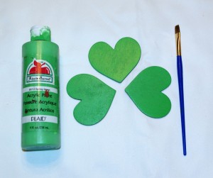 Paint each heart the desired shade of green for your wooden shamrock
