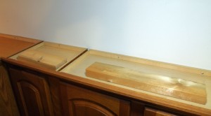 Simple Tips For Decorating Your Cabinet Tops Use deeper boards for height