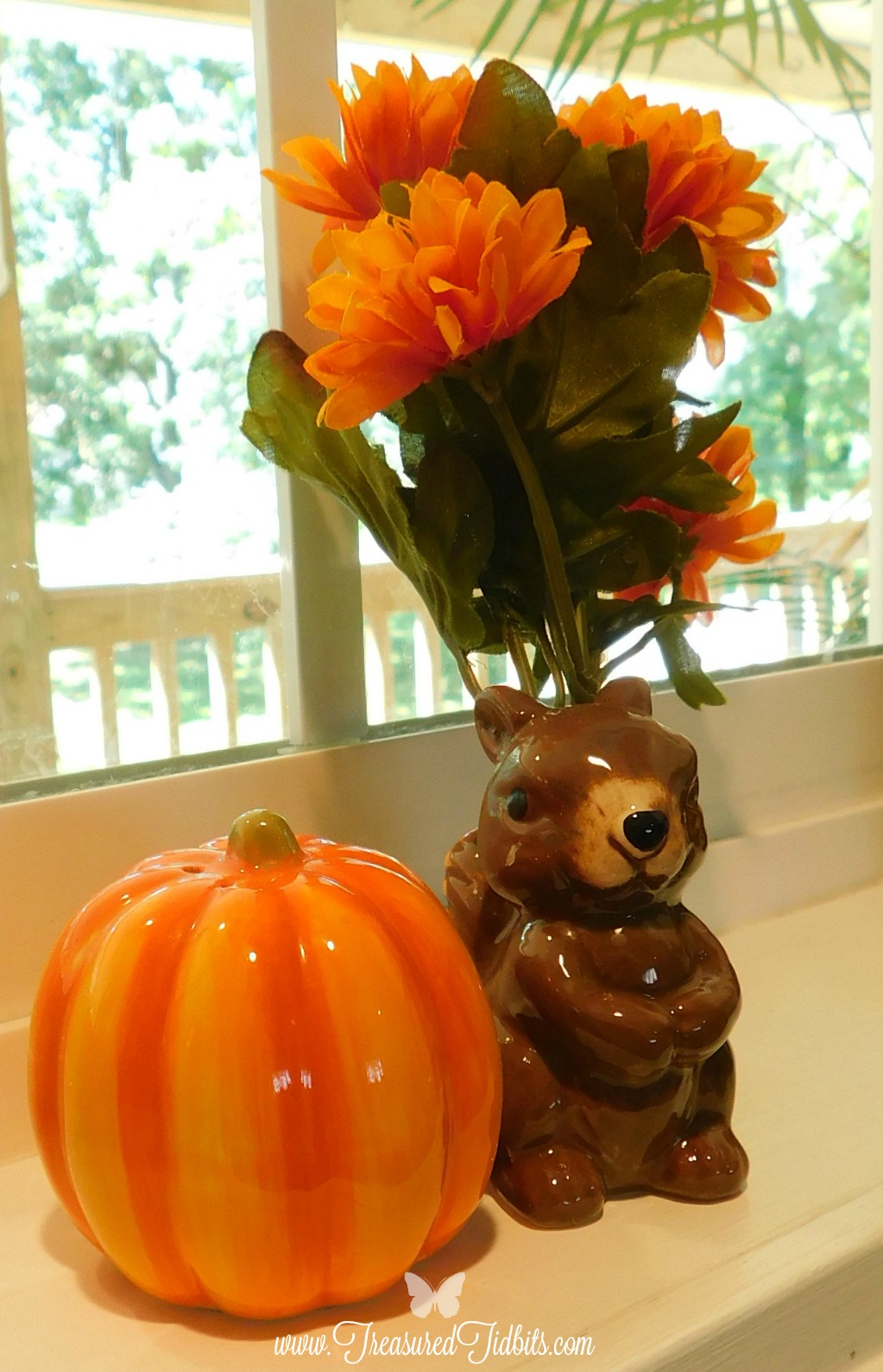Fall Tour House on the Hill Window Display Squirrel and Pumpkin